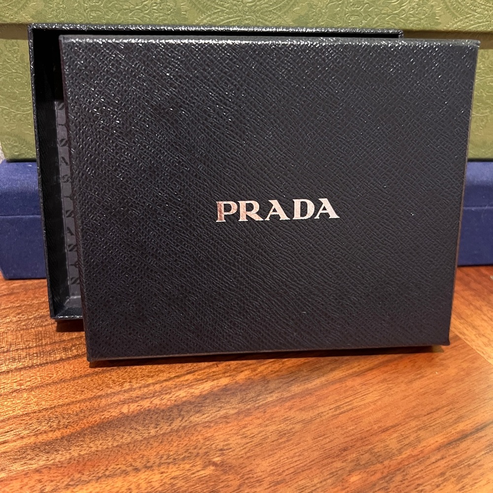 Prada Black Watch Case with Textured Material and Iconic Logo